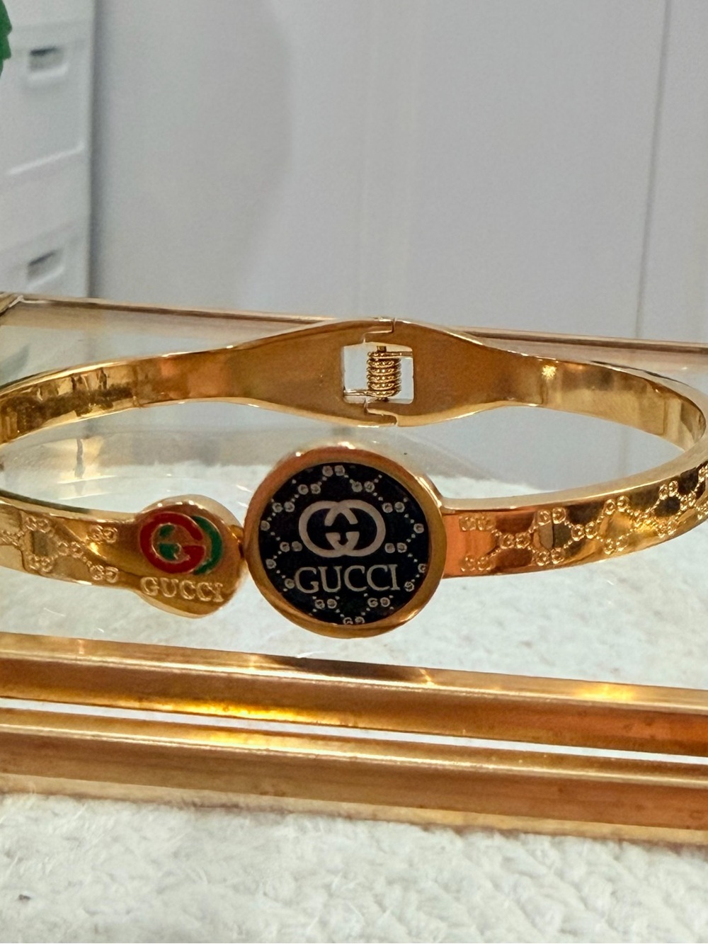 Gold Toned Stainless Steel Bangle Bracelet with Black Medallion Accent | NEW - Picture 4 of 8